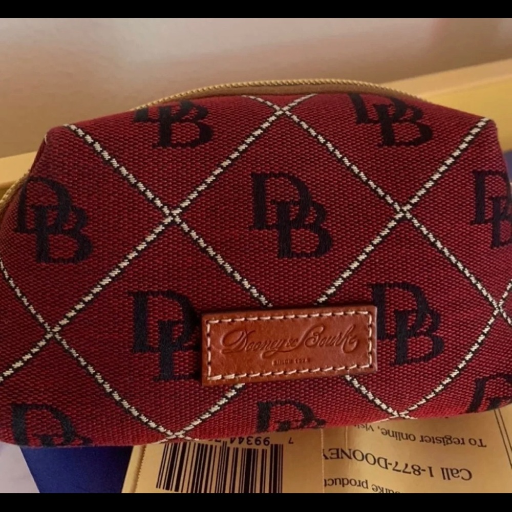 - Dooney and bourke cosmetic pouch